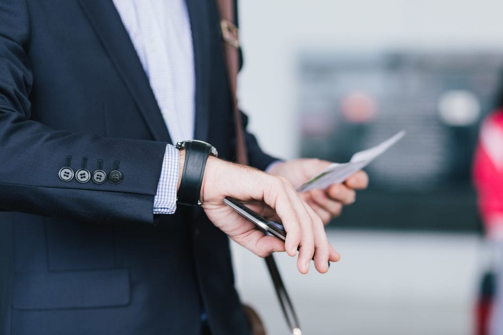  Businessman checking the time