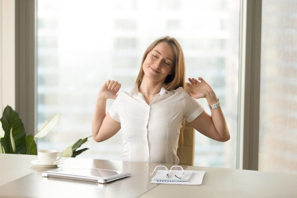 Business woman stretching