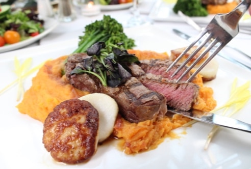 Fillet and scallops over sweet potato mash